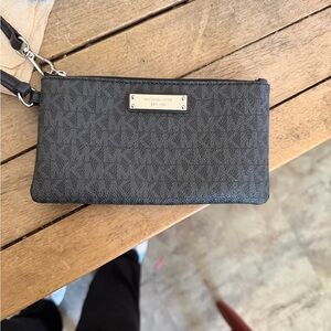 Michael Kors Black Logo-Print Wristlet with Metal Plaque